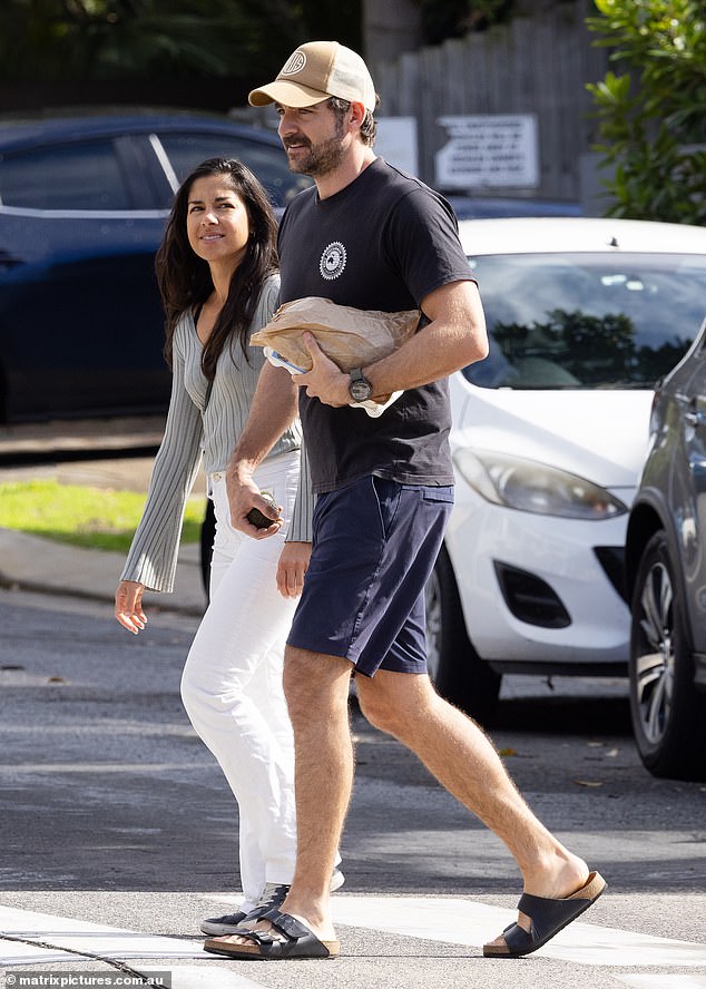Sarah Roberts finds love again following heartbreaking divorce from James Stewart as she is spotted holding hands with new man in Sydney